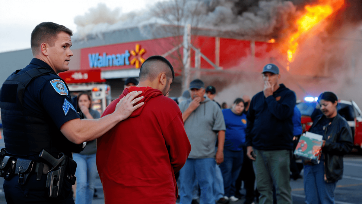 One in custody after fire at metro Walmart