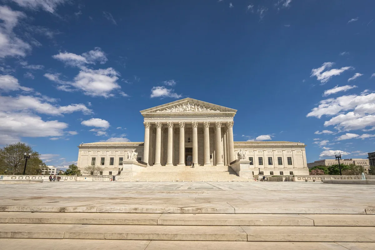 Exterior view of the U.S. Supreme Court building with marble columns and steps