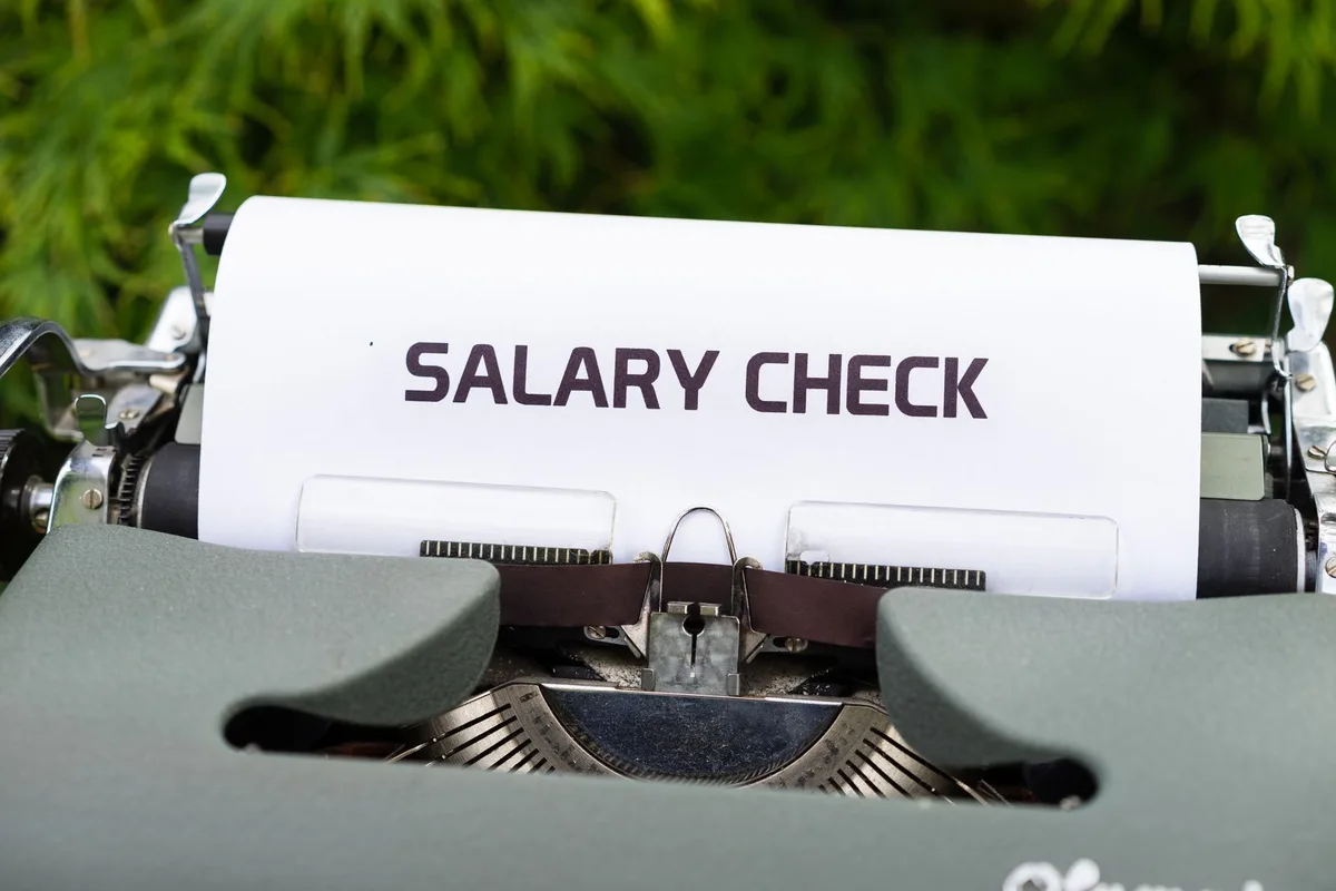 Comparison chart showing proposed salary cap limits versus current executive compensation levels