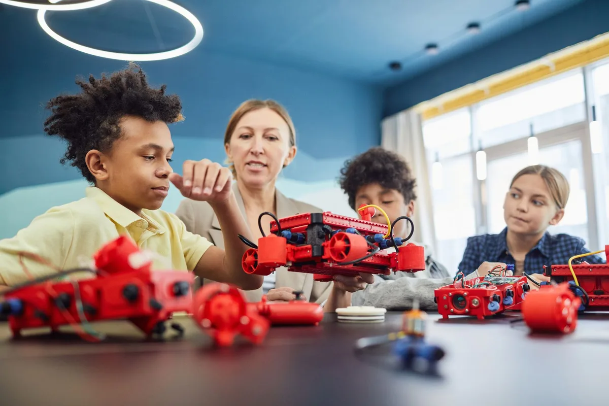 Students engaged in hands-on STEM and enrichment activities in a classroom setting