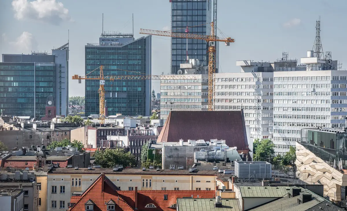 Tall mixed-use tower with completed core structure and ongoing façade and interior work