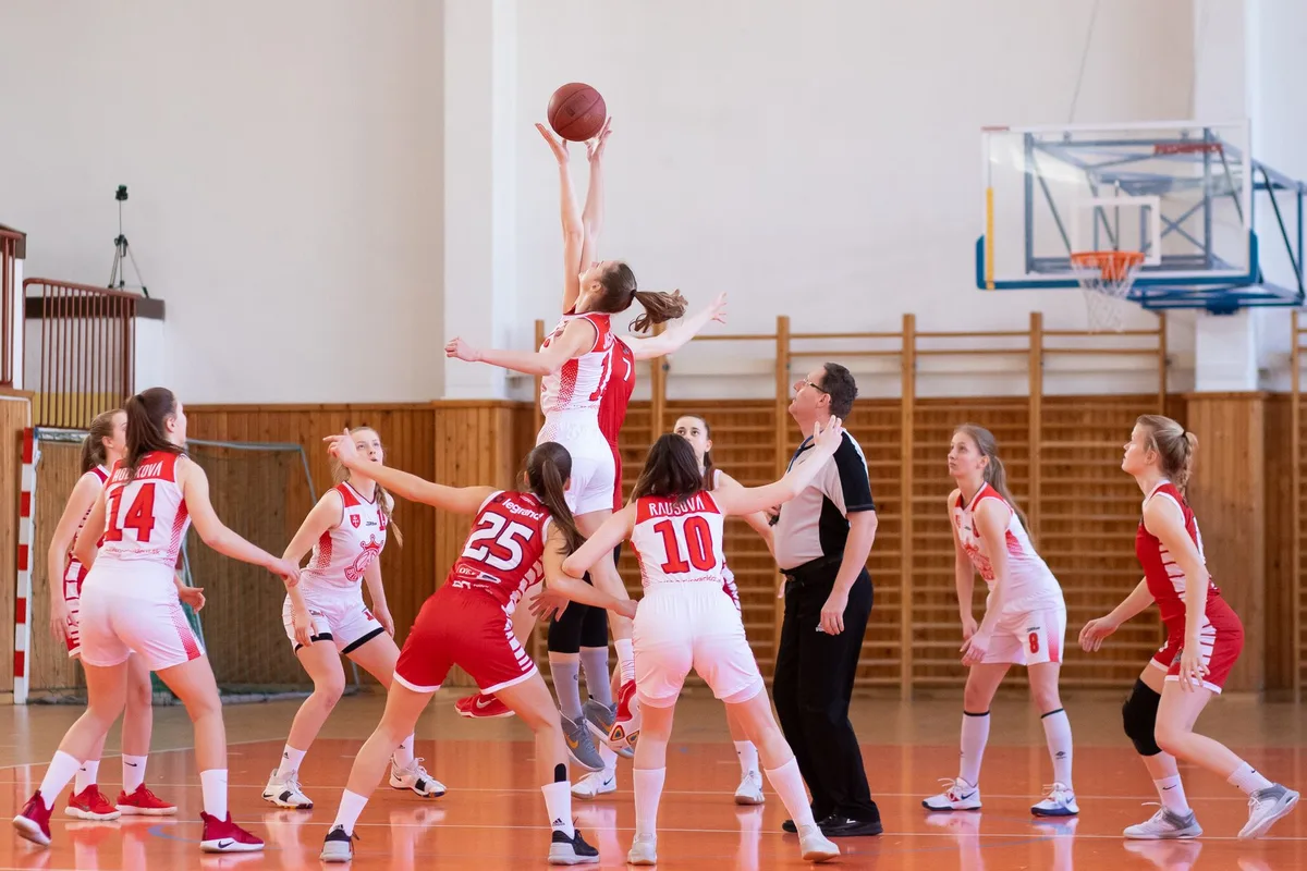 High school girls basketball player in shooting form during a game