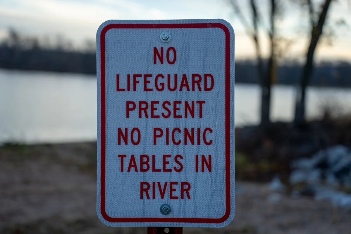 Scenic lakeside recreation area with water and shoreline during daytime