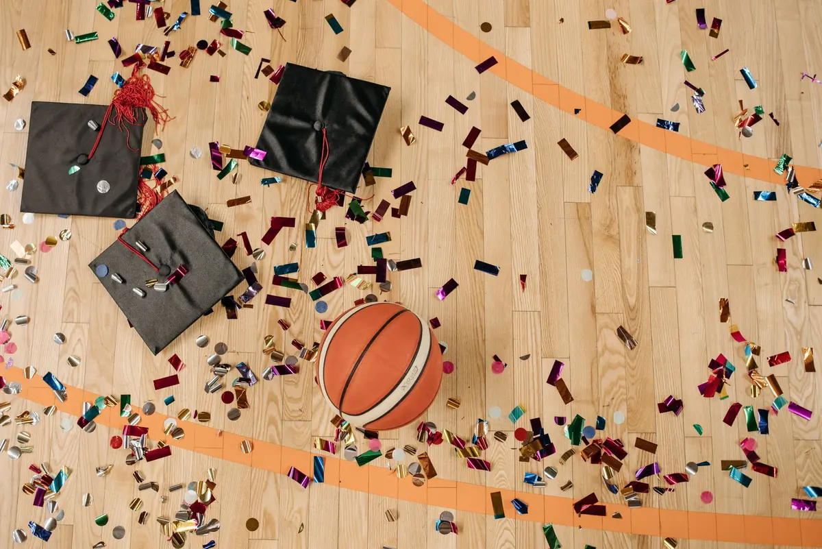 High school basketball player celebrating a state championship victory