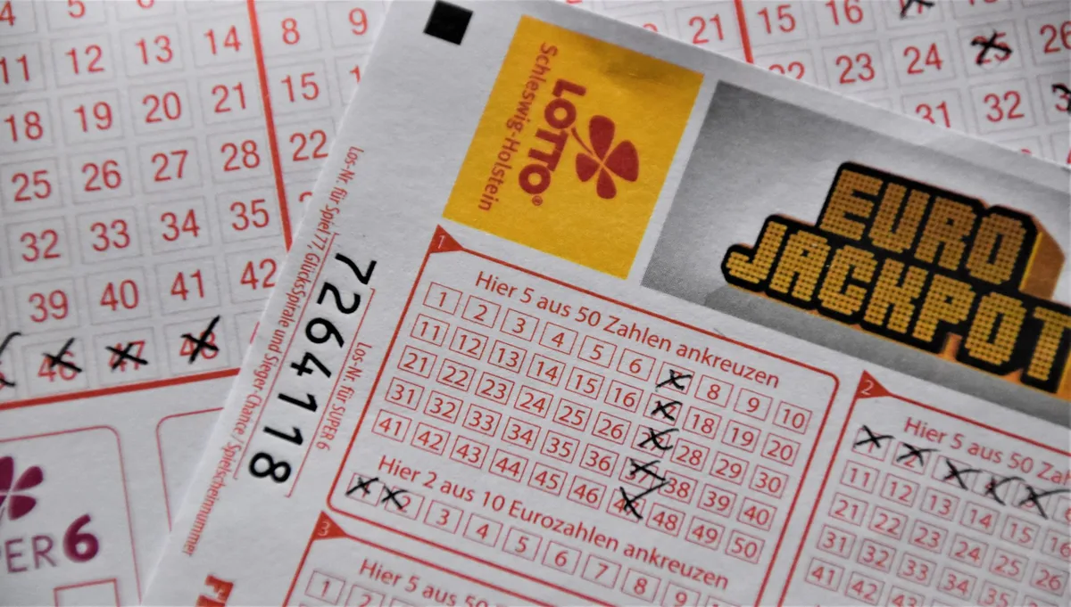 Lottery claim documents and signed ticket ready for submission