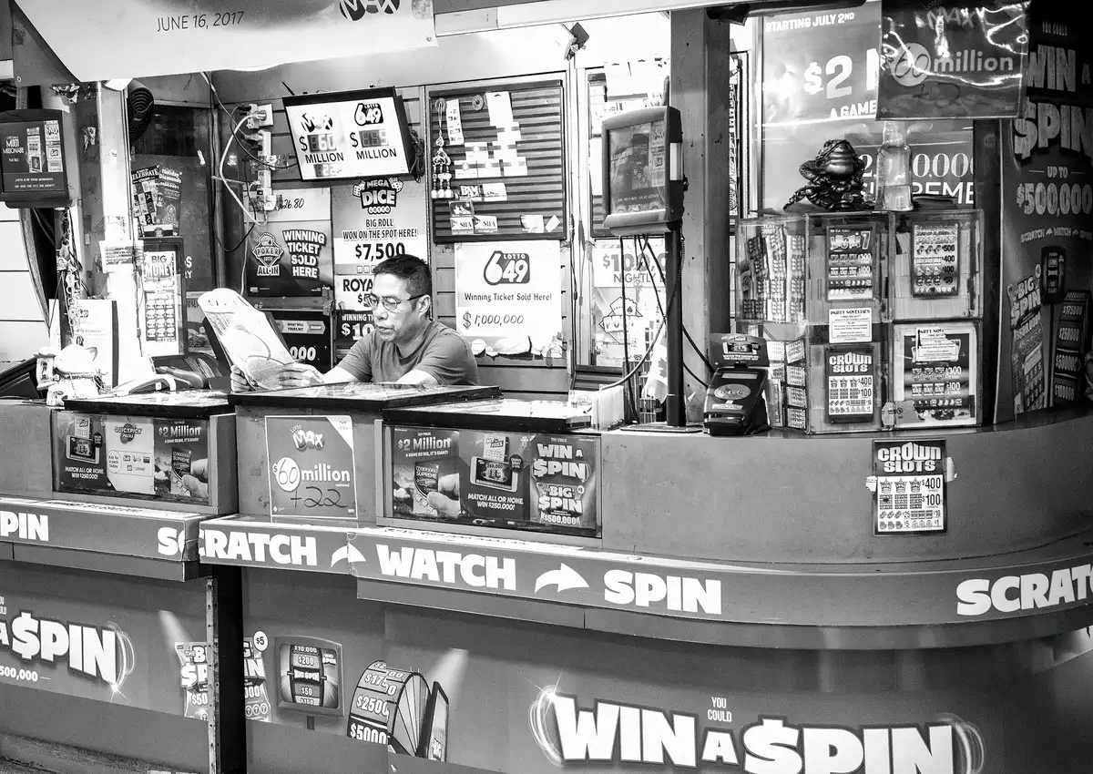 Lottery claim documentation and ticket on desk