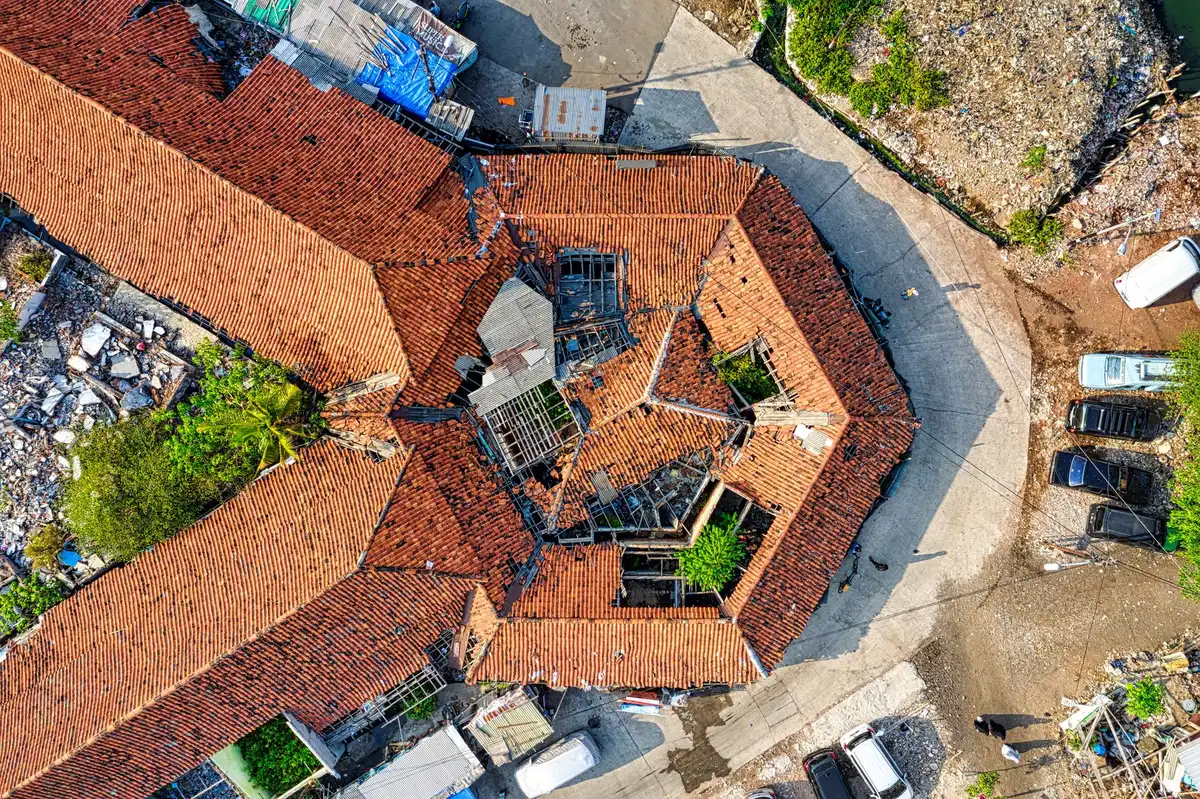 Close-up of roof damage assessment and evaluation documentation