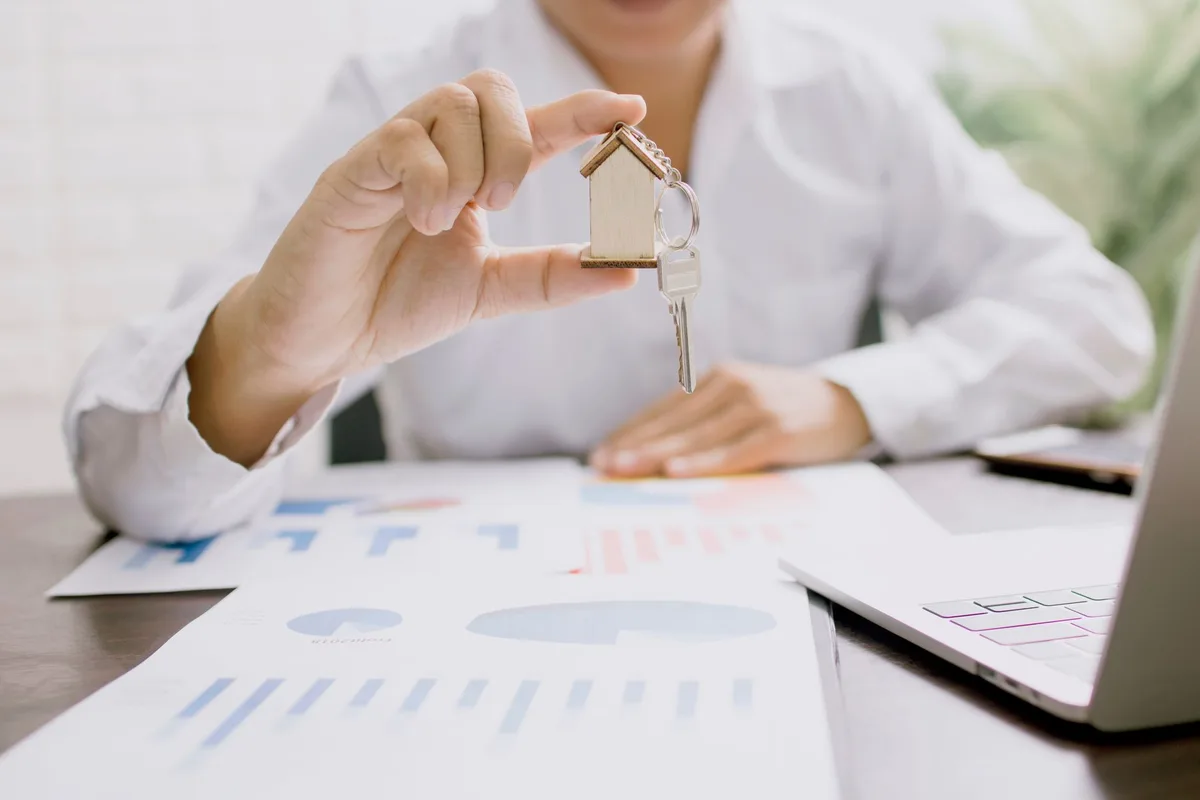 Mortgage paperwork and lending documents on a desk