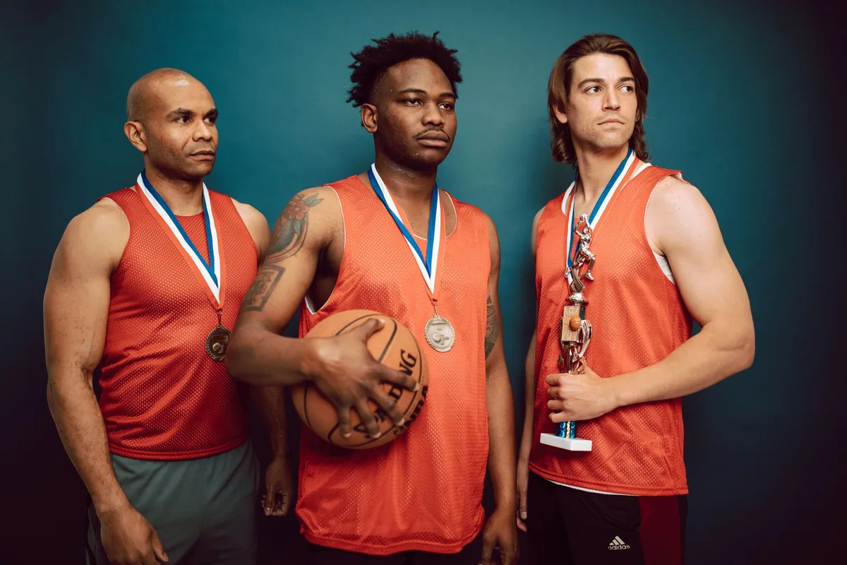 Young basketball player holding an MVP trophy or award