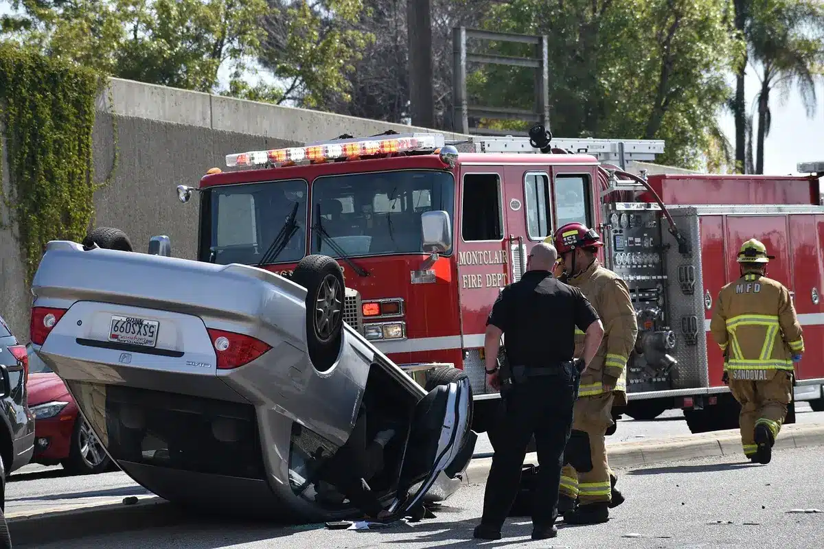 Paramedics and emergency personnel responding to a fatal vehicle collision