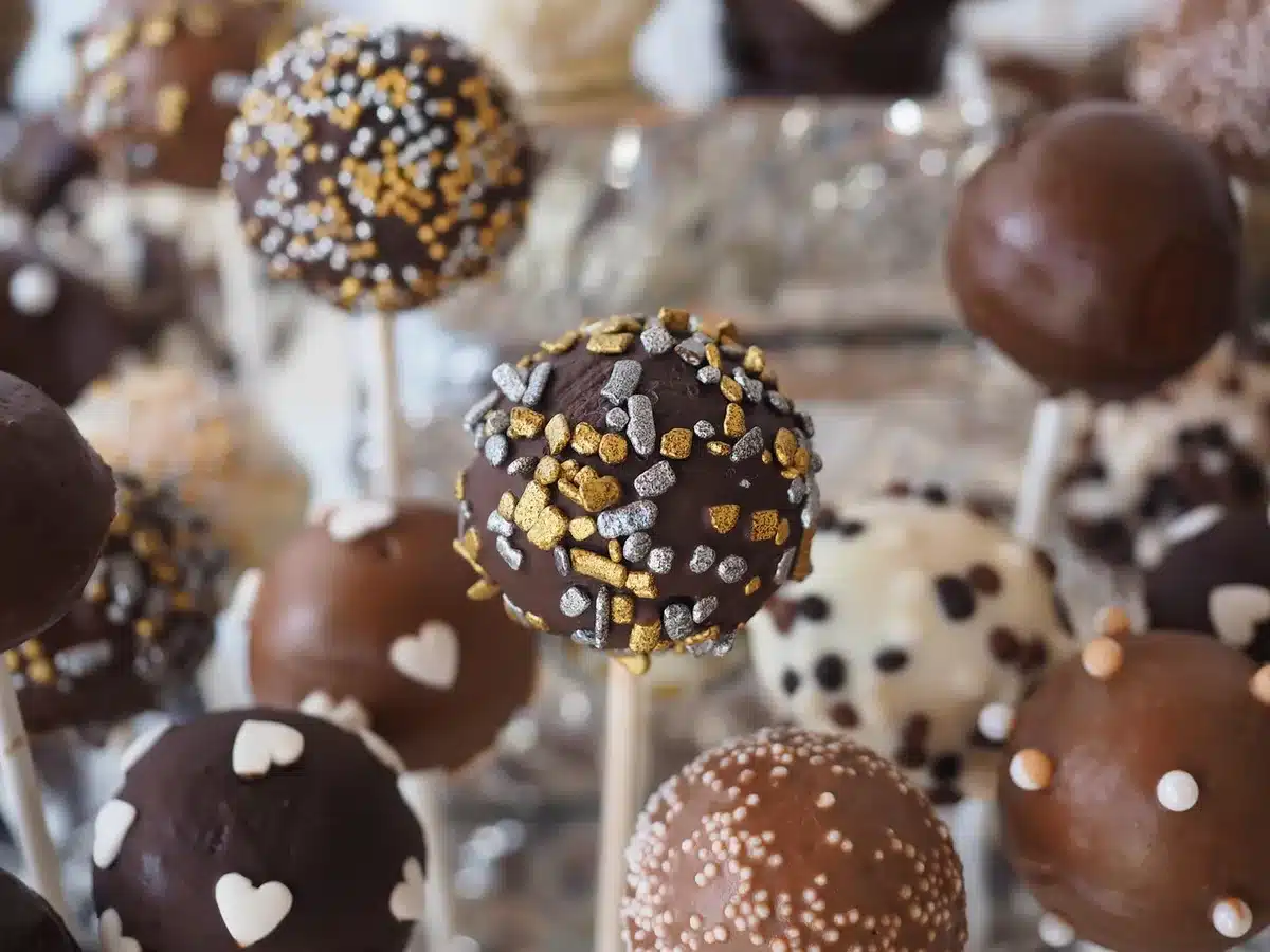 Deep-fried dessert corndogs and sweet fair treats on sticks