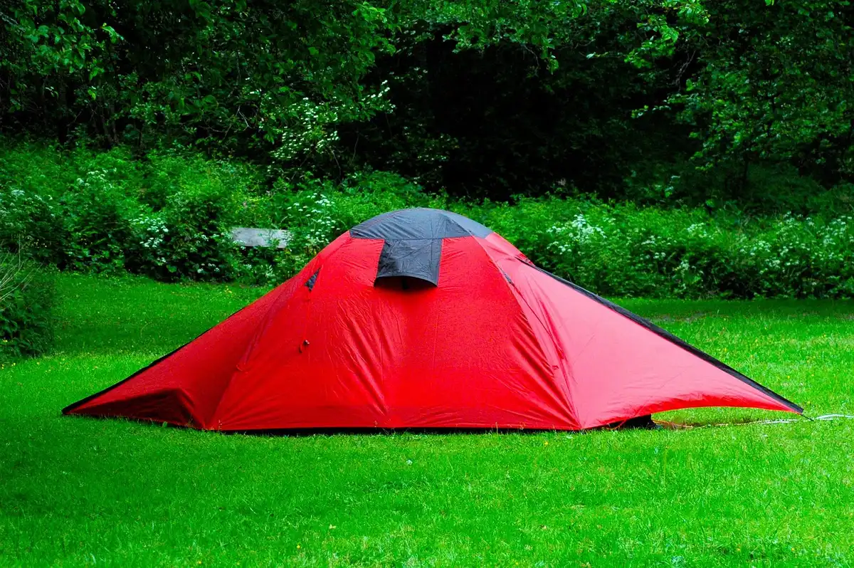 Campers and tents at a music festival ranch during the day